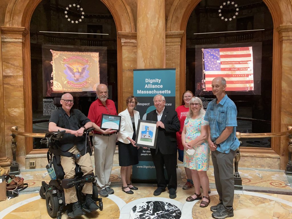 left-right: Chris Hoeh, Lachlan Forrow, Representative Linda Dean Campbell, Senator Dick Moore, Susie Backstrom, Maura Donahue, Bill Henning